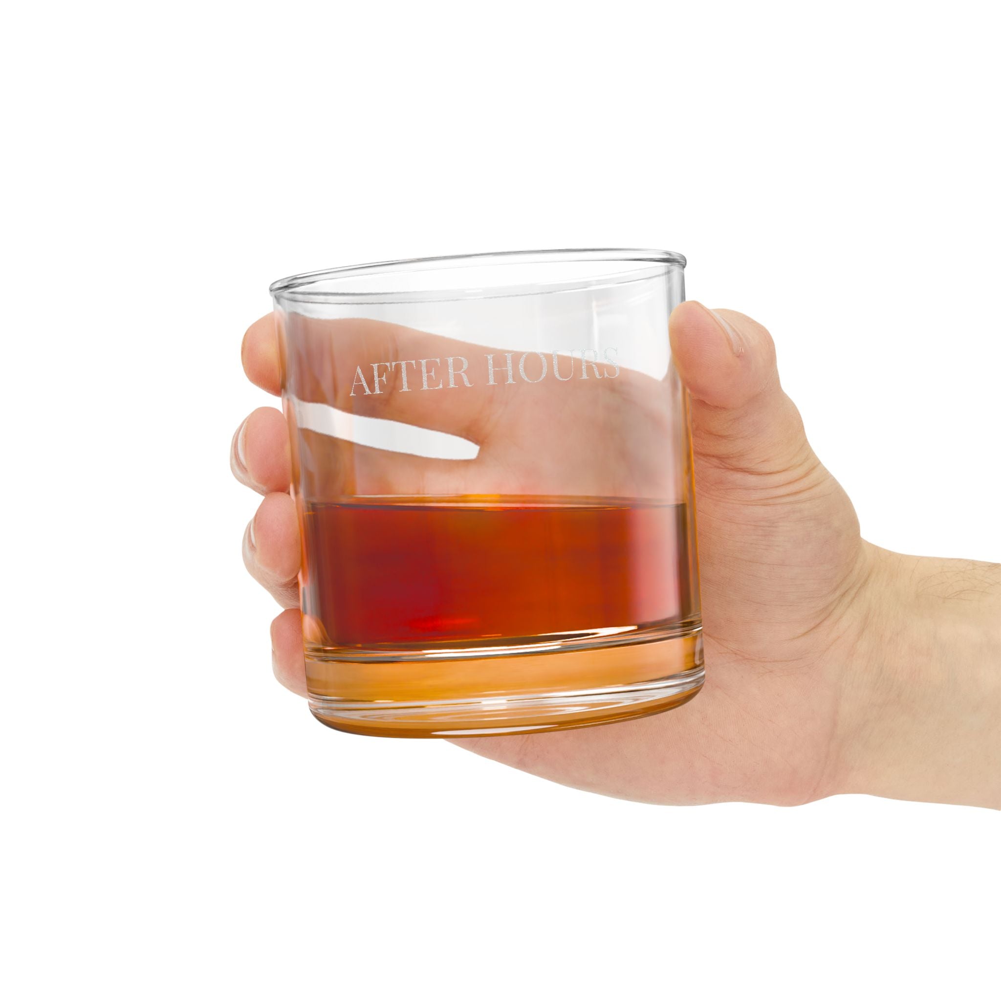 Hand holding a glass of amber liquid with 'PBR' branding on a white background
