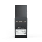 Black coffee packaging with 'The Modern Den' branding on a white background