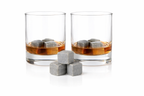 Two glasses of whiskey with whiskey stones on a white background